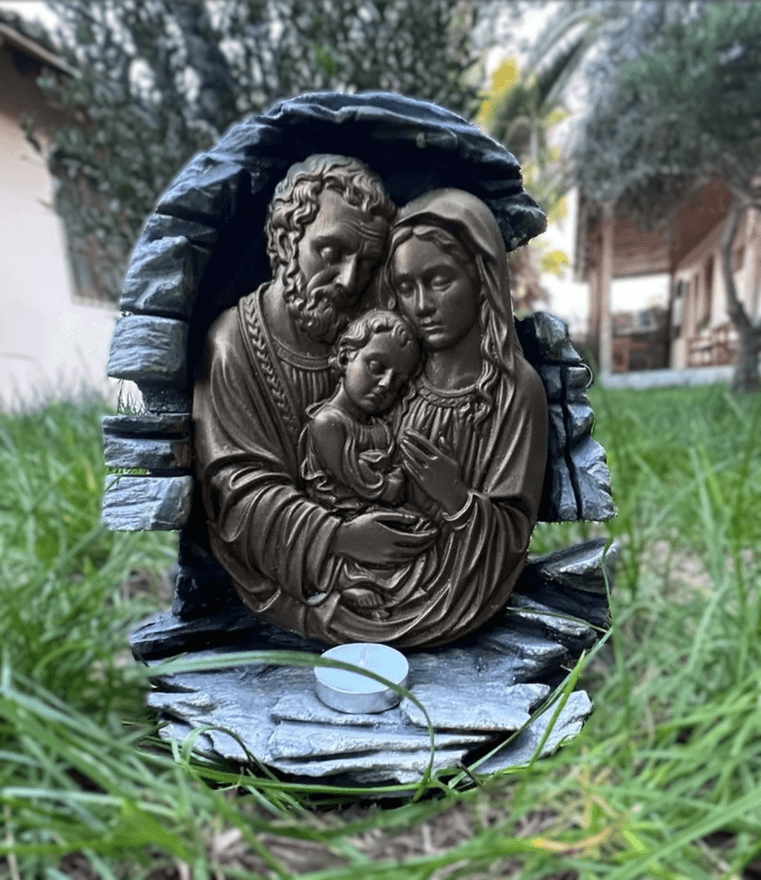 Sagrada Famila devocional con vela